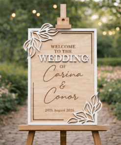 Handmade wooden wedding welcome board with layered leaf corner accents