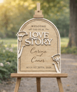 Love Story wedding welcome board in natural wood finish displayed on easel